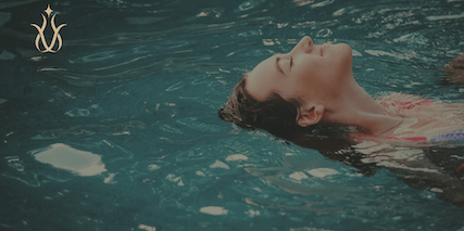 Woman relaxing in water