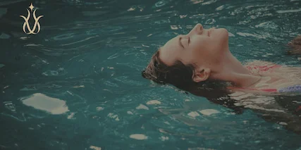 Woman relaxing in water
