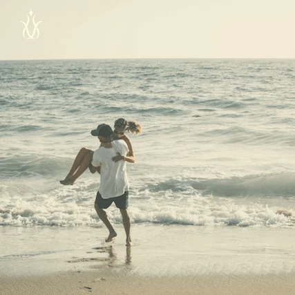 couple running on a beach